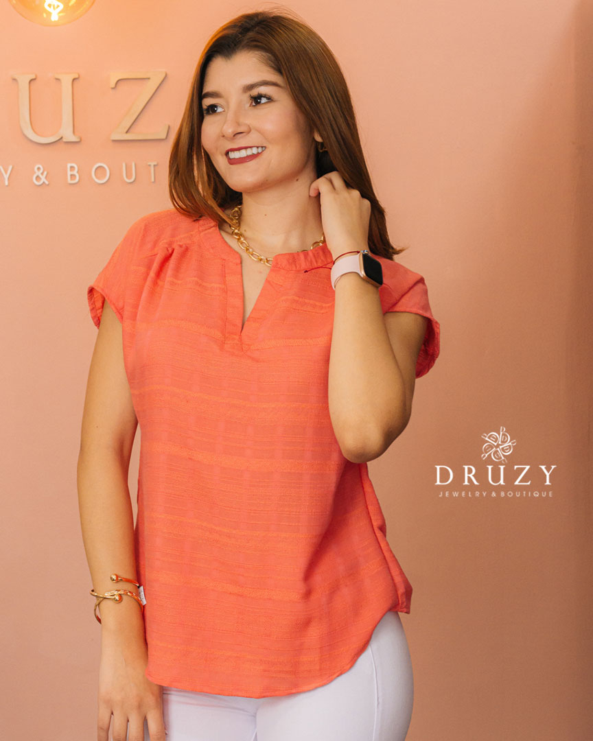 Blusa coral manga caída
